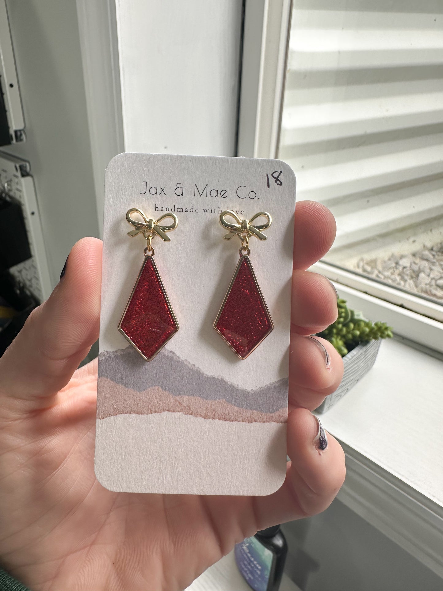 Red glitter kites with bow